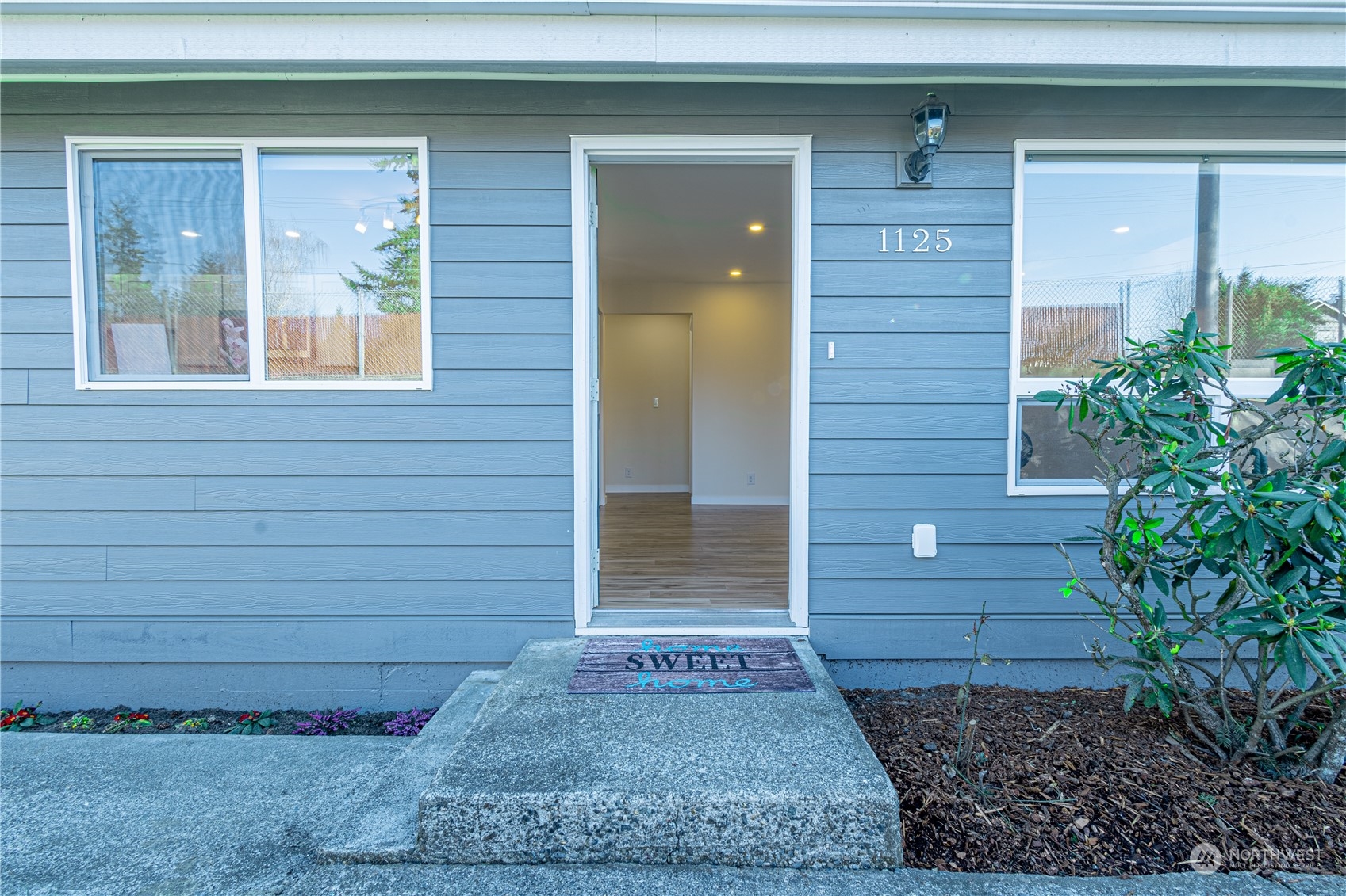 1125 Southwest 356th Street Federal Way, WA 98023 - Photo 4 of 27 a front view of a house