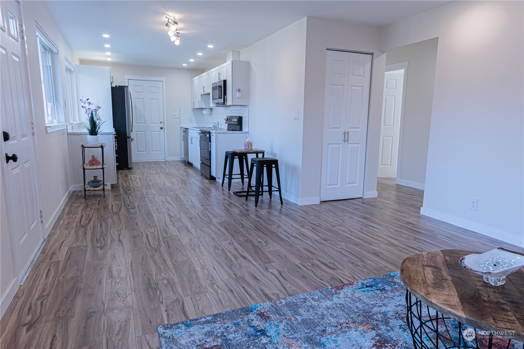 1125 Southwest 356th Street Federal Way, WA 98023 - Photo 5 of 27 a view of a livingroom with furniture and hardwood floor