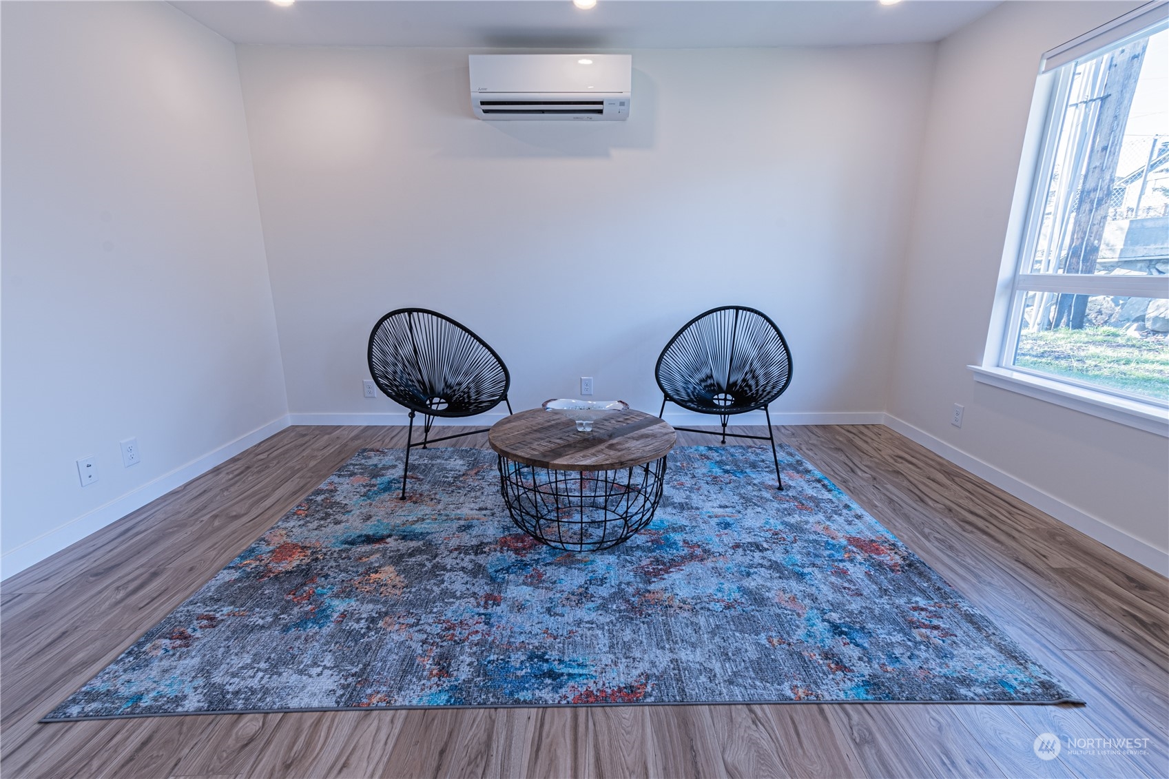 1125 Southwest 356th Street Federal Way, WA 98023 - Photo 7 of 27 a room with two chandeliers