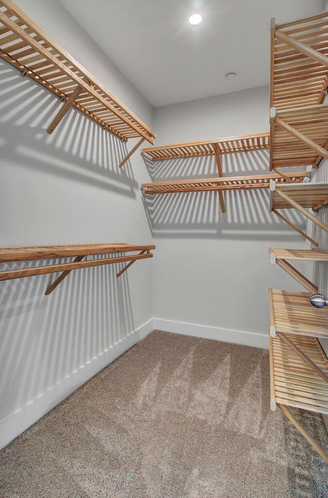 2139 Tides End Road Charleston, SC 29412 - Photo 13 of 55 Owners Closet w: Hand Built Shelving