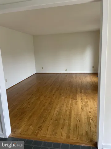 a view of a hallway view with staircase