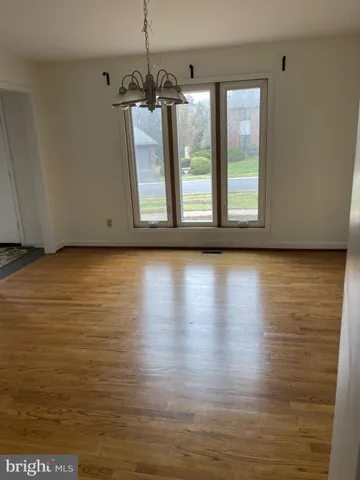 a kitchen with a sink and a stove top oven