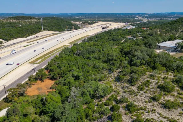 a view of a terrace with yard and lake view
