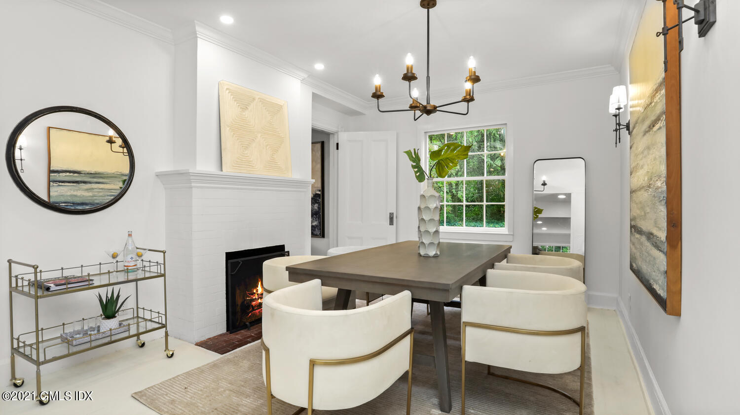23 Parsonage Road Greenwich, CT 06830 - Photo 12 of 29 a dining room with furniture and a chandelier