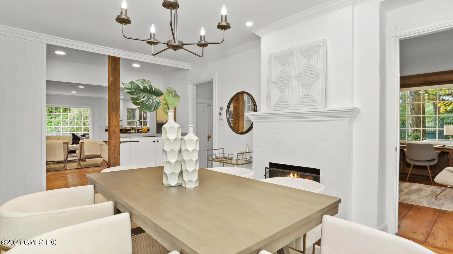 23 Parsonage Road Greenwich, CT 06830 - Photo 14 of 29 a dining room with a table chairs and a fireplace