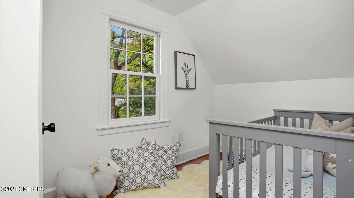 23 Parsonage Road Greenwich, CT 06830 - Photo 18 of 29 a view of a bedroom with a window