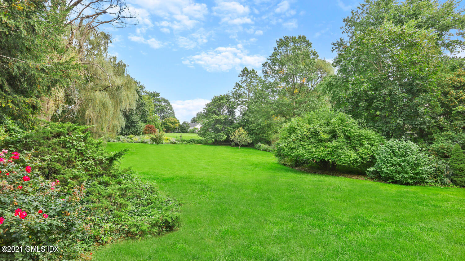 23 Parsonage Road Greenwich, CT 06830 - Photo 26 of 29 a view of a lush green space