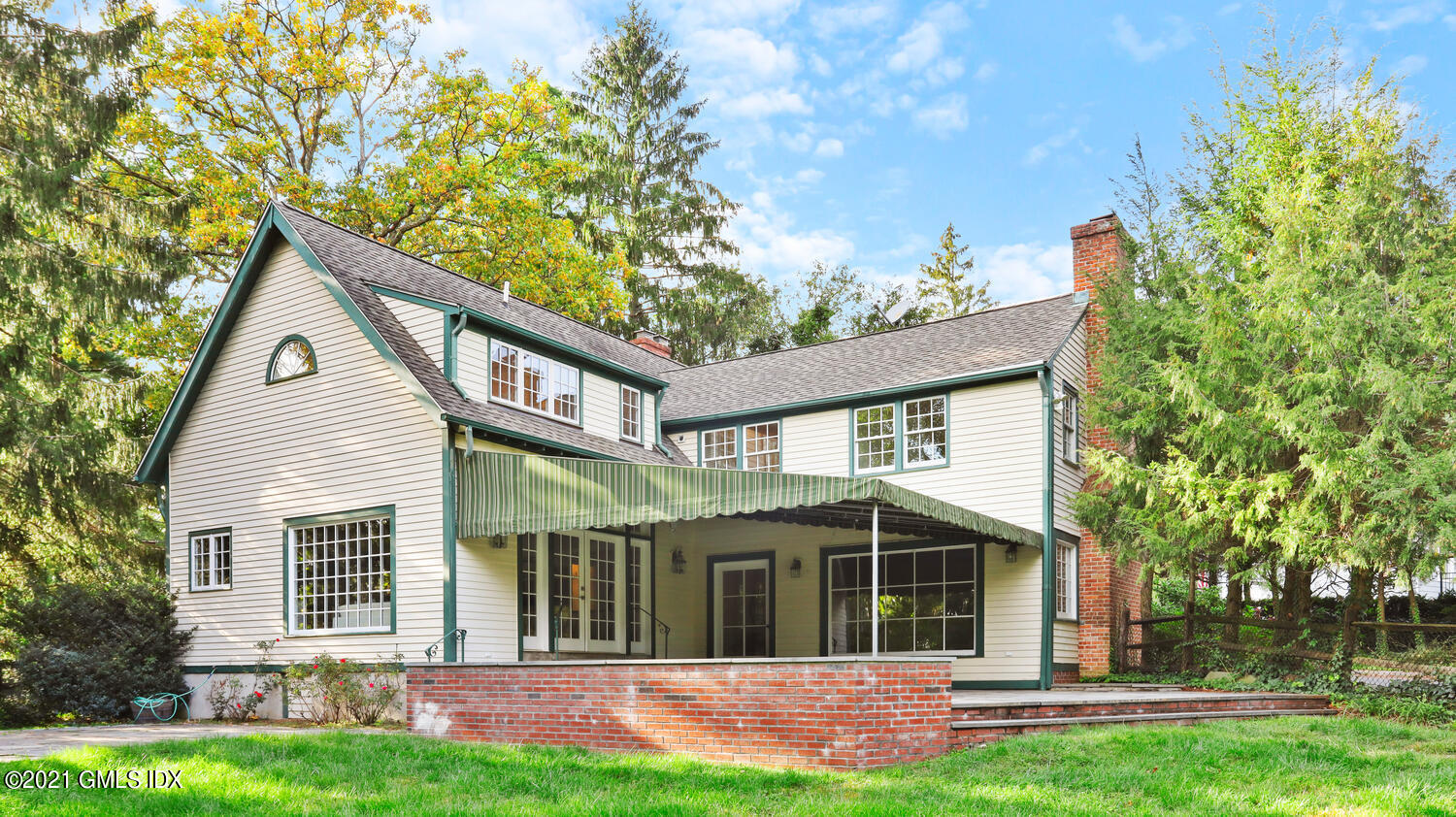 23 Parsonage Road Greenwich, CT 06830 - Photo 27 of 29 front view of a house and a yard