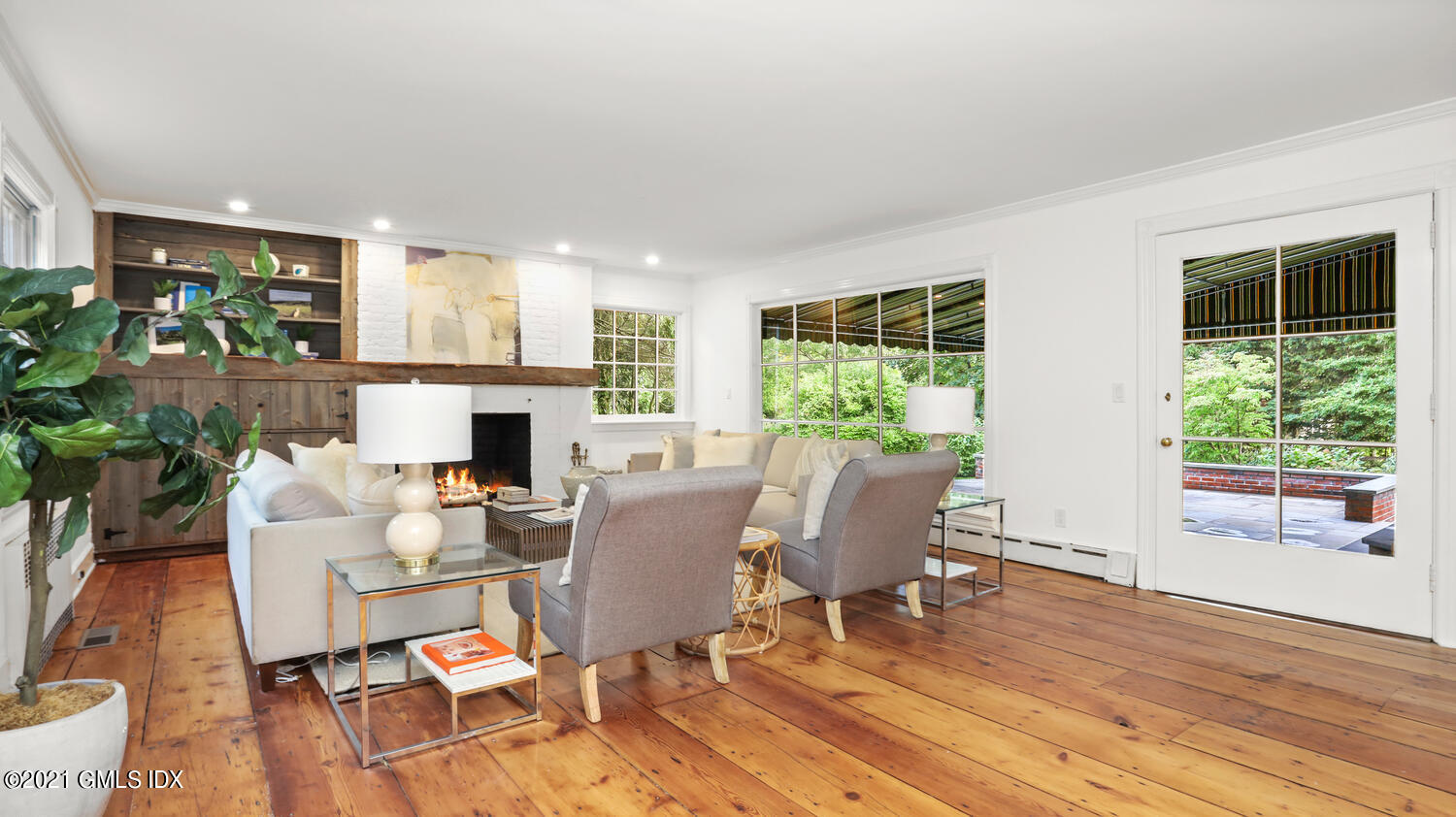 23 Parsonage Road Greenwich, CT 06830 - Photo 7 of 29 a view of a dining room with furniture window and wooden floor