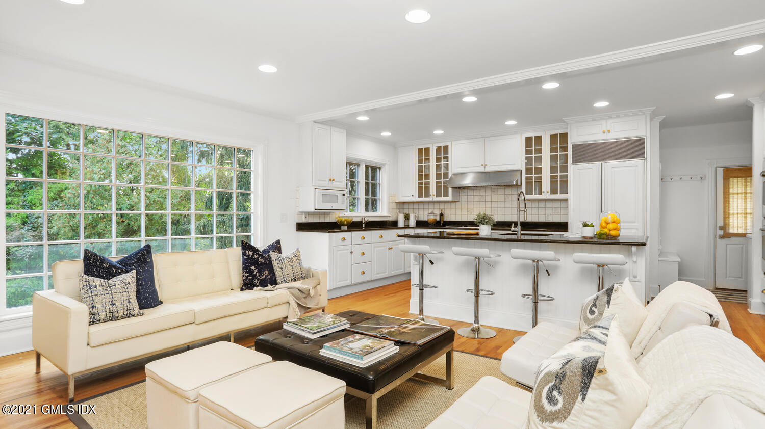 23 Parsonage Road Greenwich, CT 06830 - Photo 8 of 29 a living room with furniture and a large window