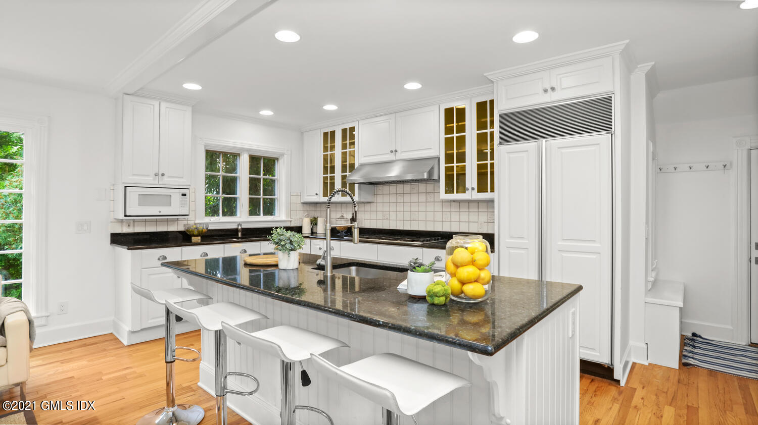 23 Parsonage Road Greenwich, CT 06830 - Photo 10 of 29 a kitchen with stainless steel appliances granite countertop a sink refrigerator and cabinets