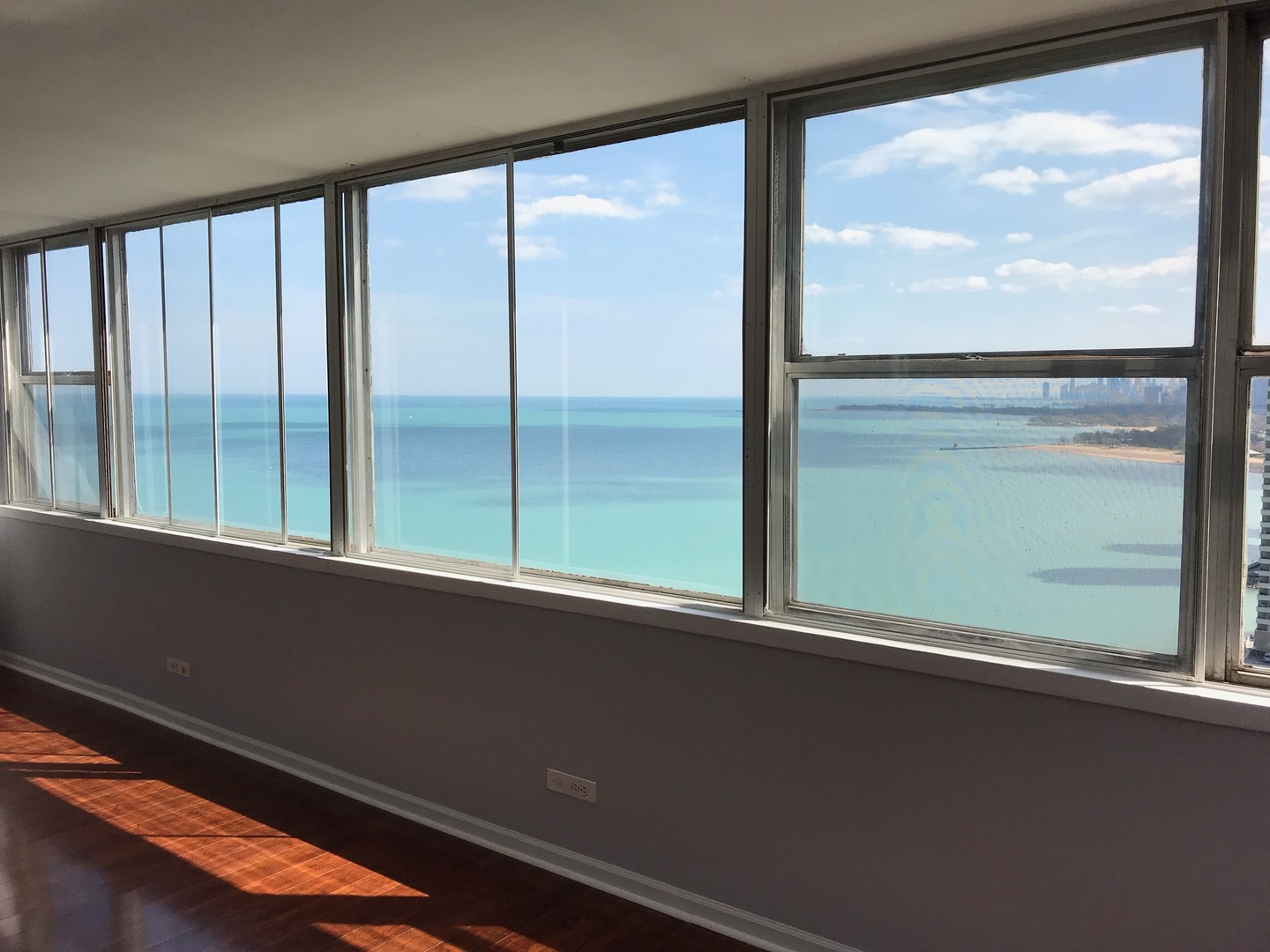 6301 North Sheridan Road, Unit 23V Chicago, IL 60660 - Photo 2 of 22 a view of a window in an empty room