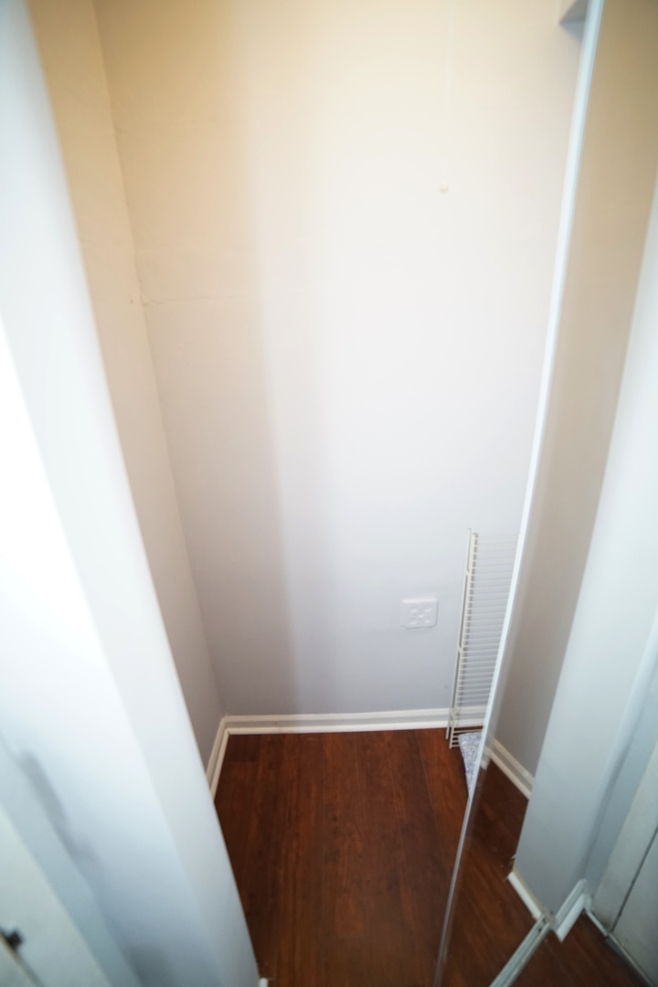6301 North Sheridan Road, Unit 23V Chicago, IL 60660 - Photo 14 of 22 a view of small space with racks on the wall