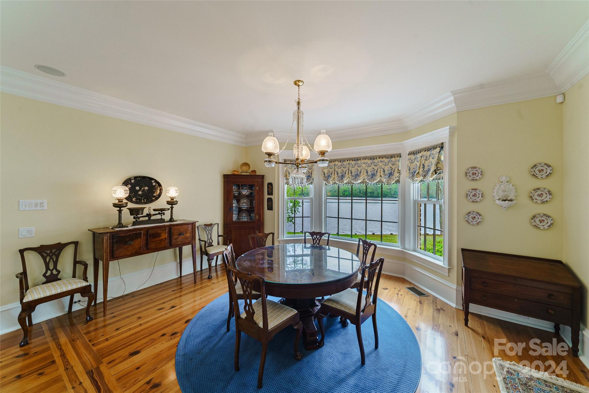 229 Joseph Kershaw Road Eastover, SC 29044 - Photo 13 of 48 a view of a dining room with furniture window and wooden floor