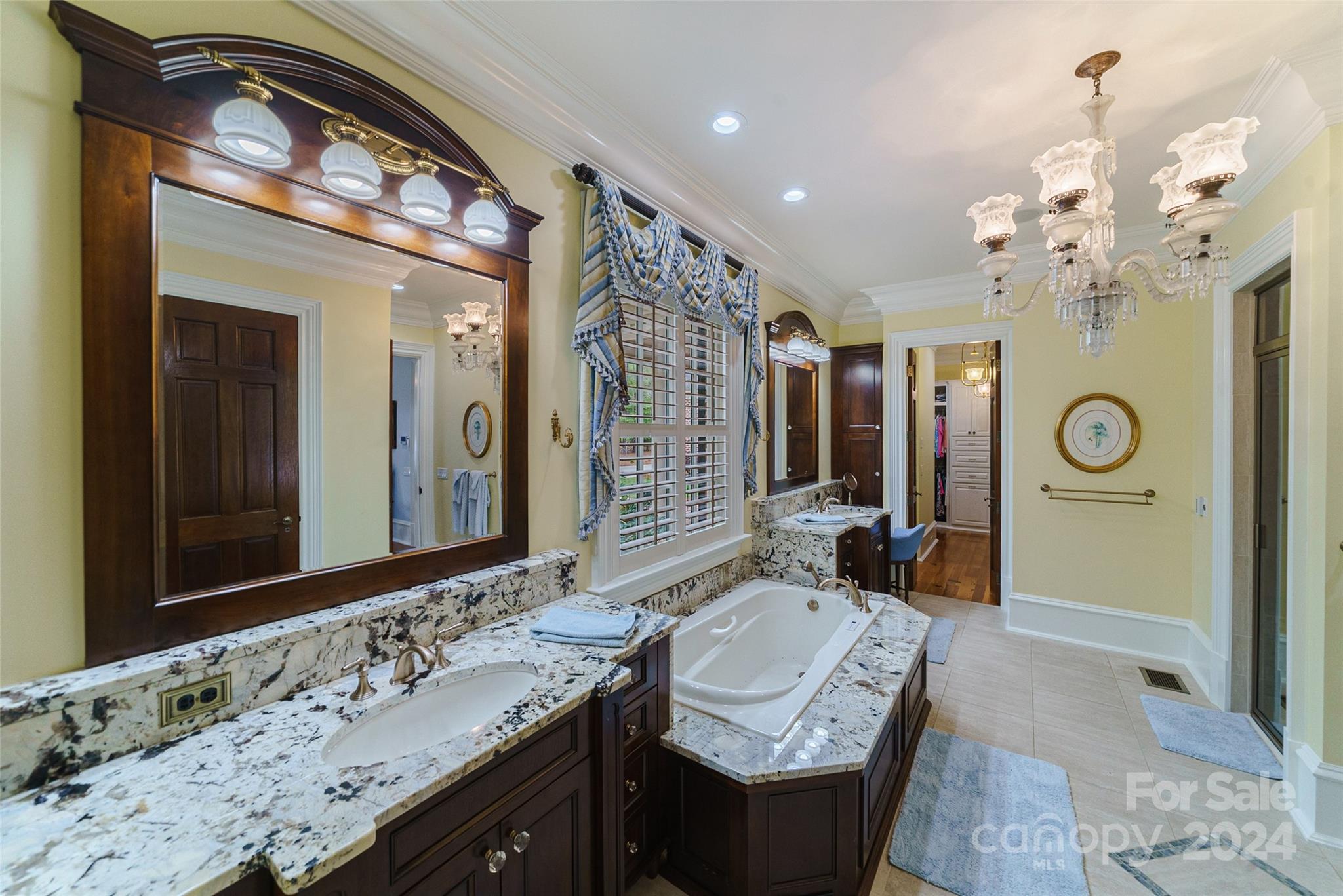 229 Joseph Kershaw Road Eastover, SC 29044 - Photo 16 of 48 a bathroom with a granite countertop sink and a mirror
