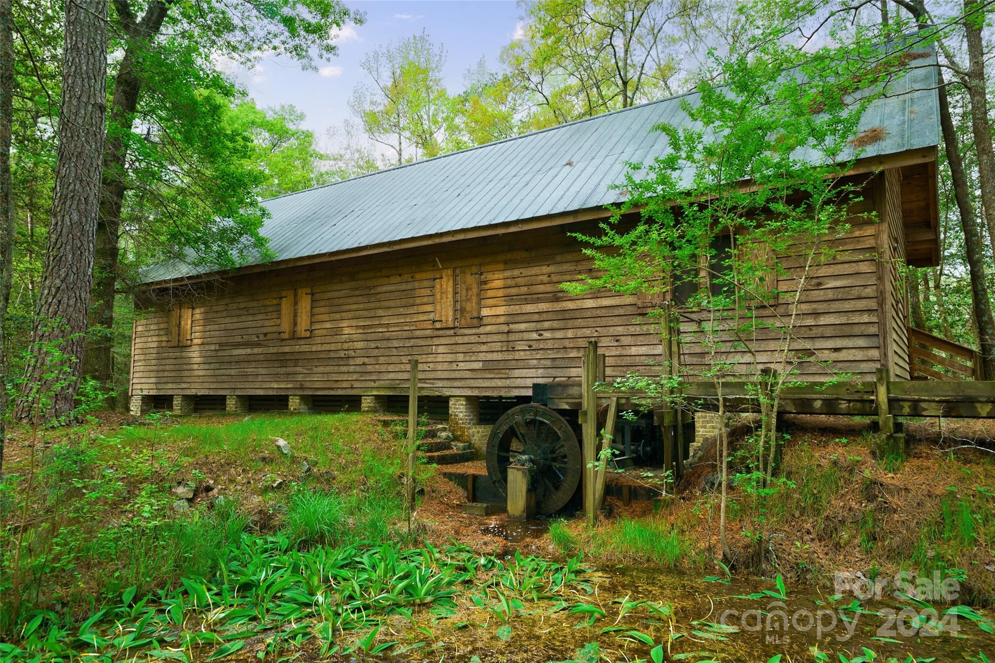 229 Joseph Kershaw Road Eastover, SC 29044 - Photo 40 of 48 a view of a backyard with plants