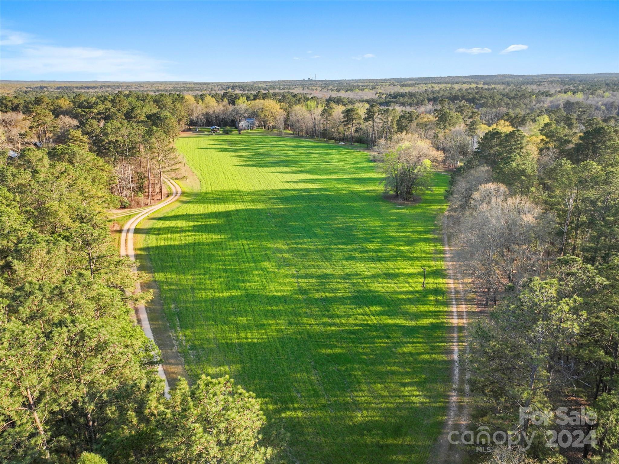 229 Joseph Kershaw Road Eastover, SC 29044 - Photo 43 of 48 a view of a lake with a city