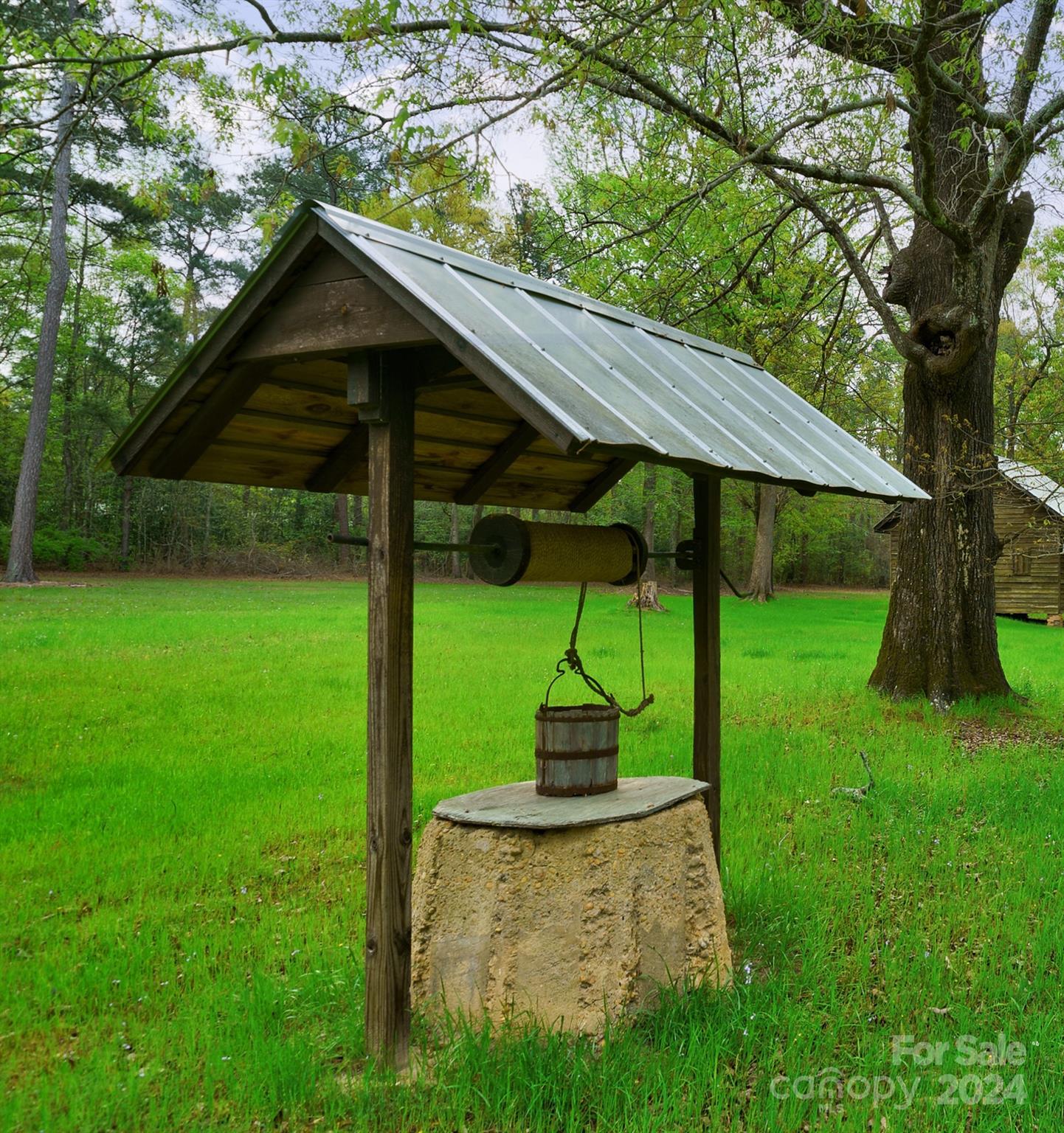 229 Joseph Kershaw Road Eastover, SC 29044 - Photo 5 of 48 a small barn in front of a house with a yard