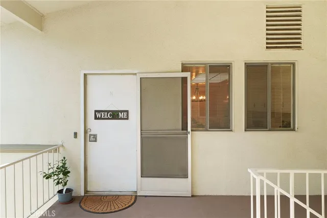 a refrigerator freezer sitting inside of a kitchen