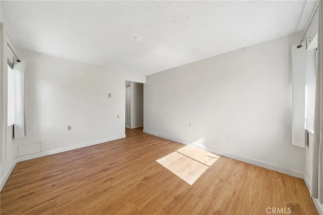 a bedroom with a bed and a table in it