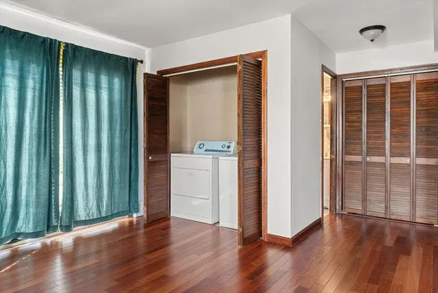 a bathroom with a sink a toilet and shower curtain