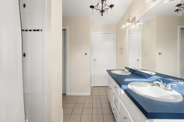 a view of a room with wooden floor and window