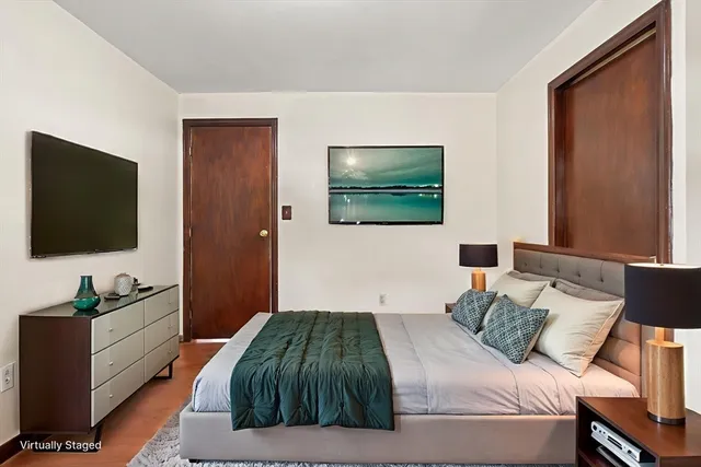 a view of living room with furniture and natural light