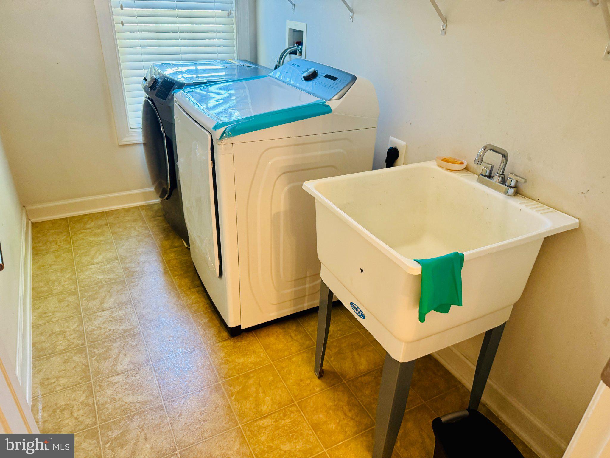 10815 Catron Road Perry Hall, MD 21128 - Photo 33 of 35 Bright and functional laundry space.