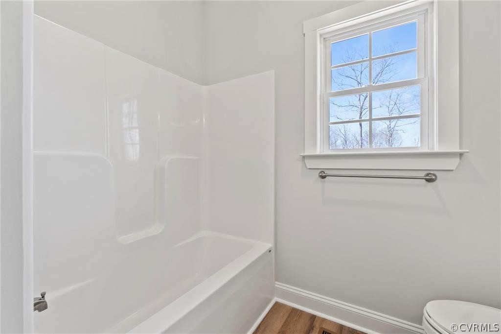 2148 Sandy Hook Road Goochland, VA 23063 - Photo 24 of 34 a bathroom with a shower and a toilet
