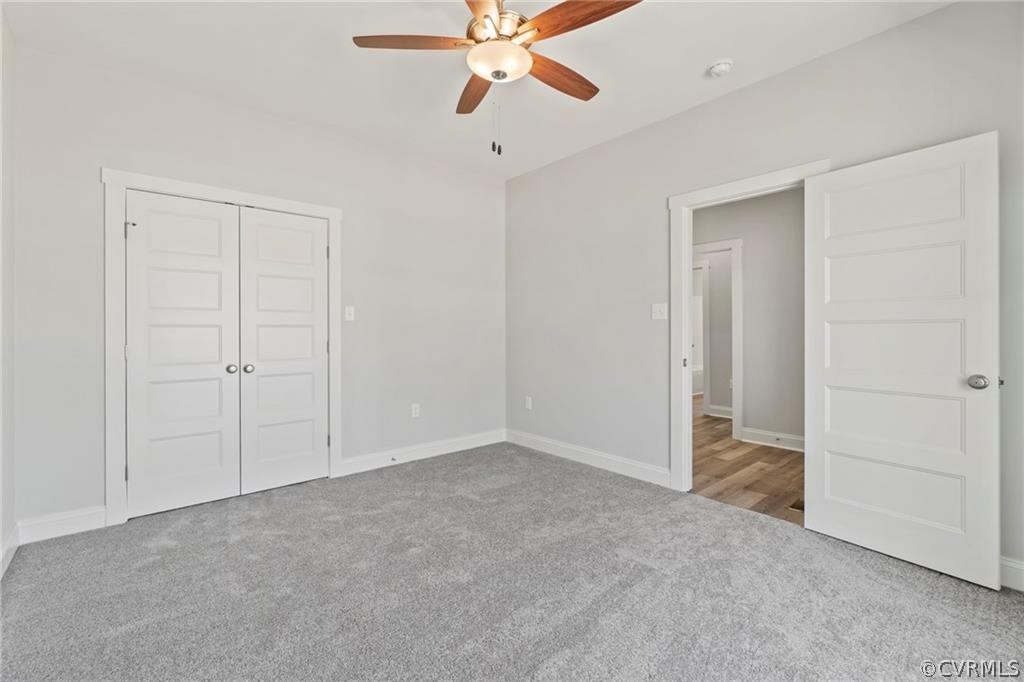 2148 Sandy Hook Road Goochland, VA 23063 - Photo 26 of 34 a view of an empty room and chandelier fan
