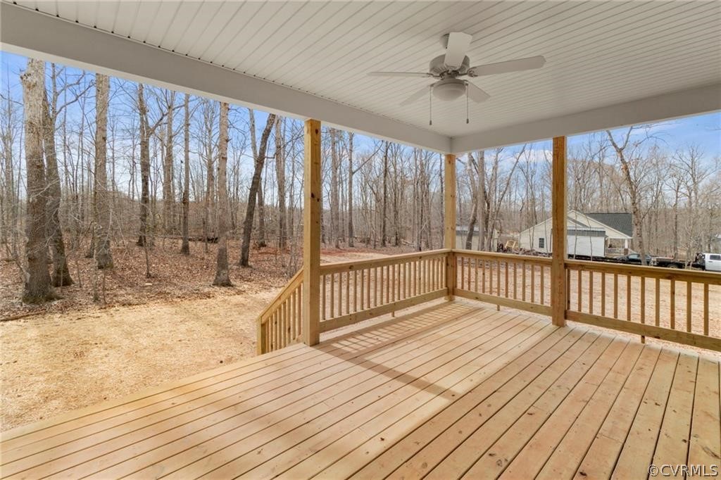 2148 Sandy Hook Road Goochland, VA 23063 - Photo 32 of 34 a view of a room with wooden floor and iron stairs