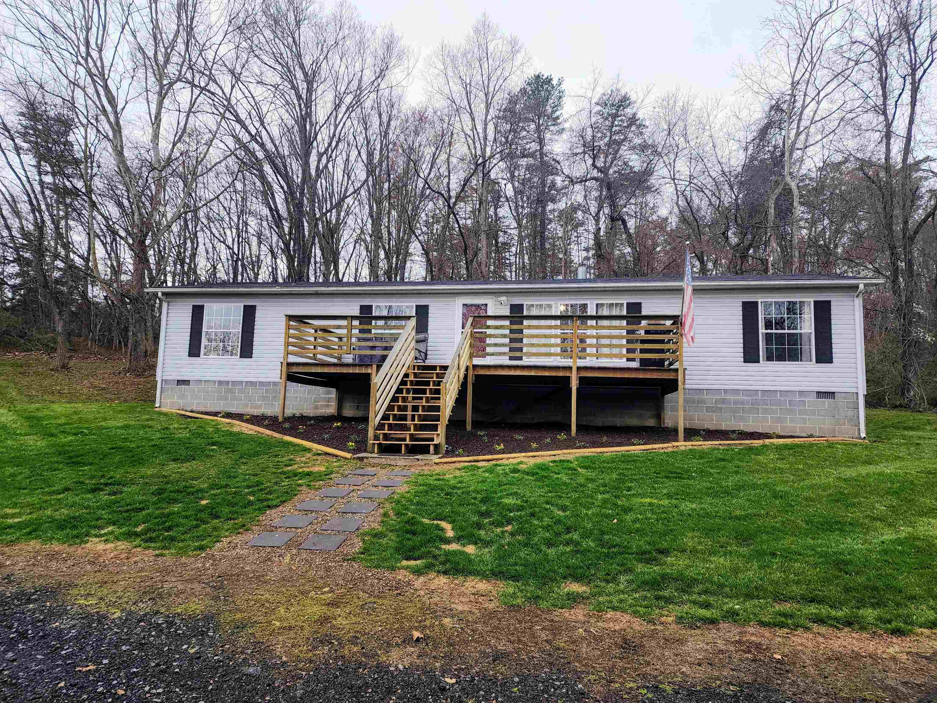 75 Jericho Road Fishersville, VA 22939 - Photo 1 of 46 a view of a house with a yard and sitting area