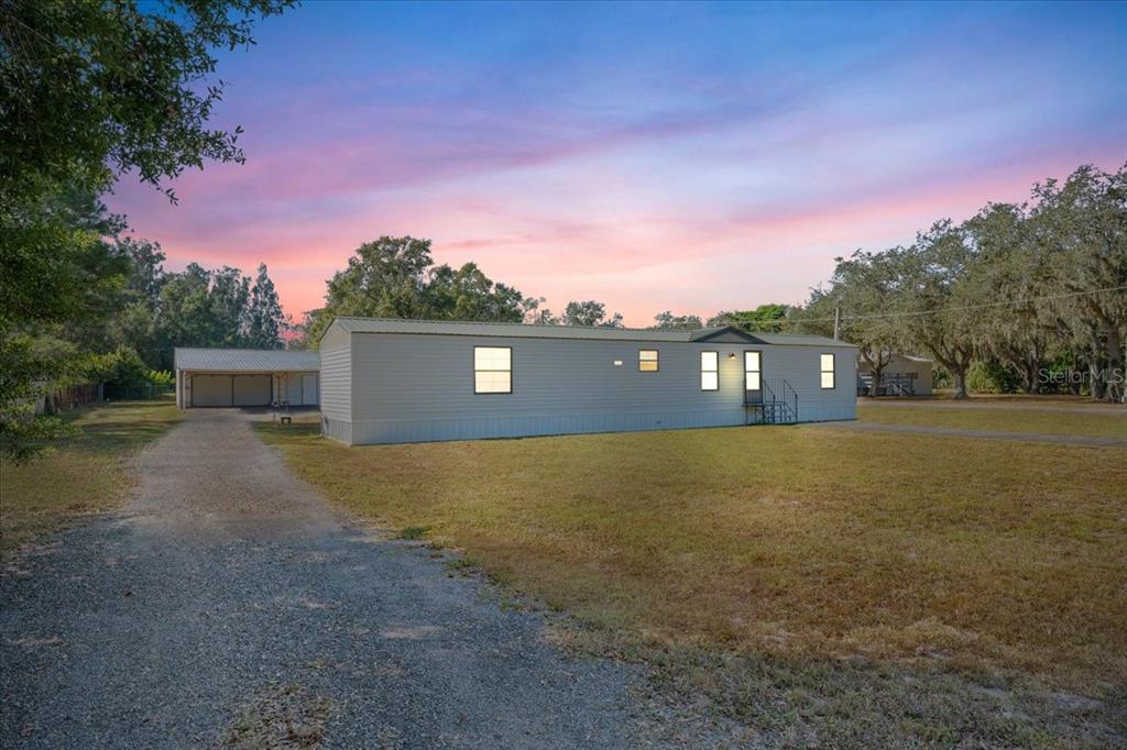 12001 Rhodine Road Riverview, FL 33579 - Photo 1 of 61 a view of outdoor space and yard