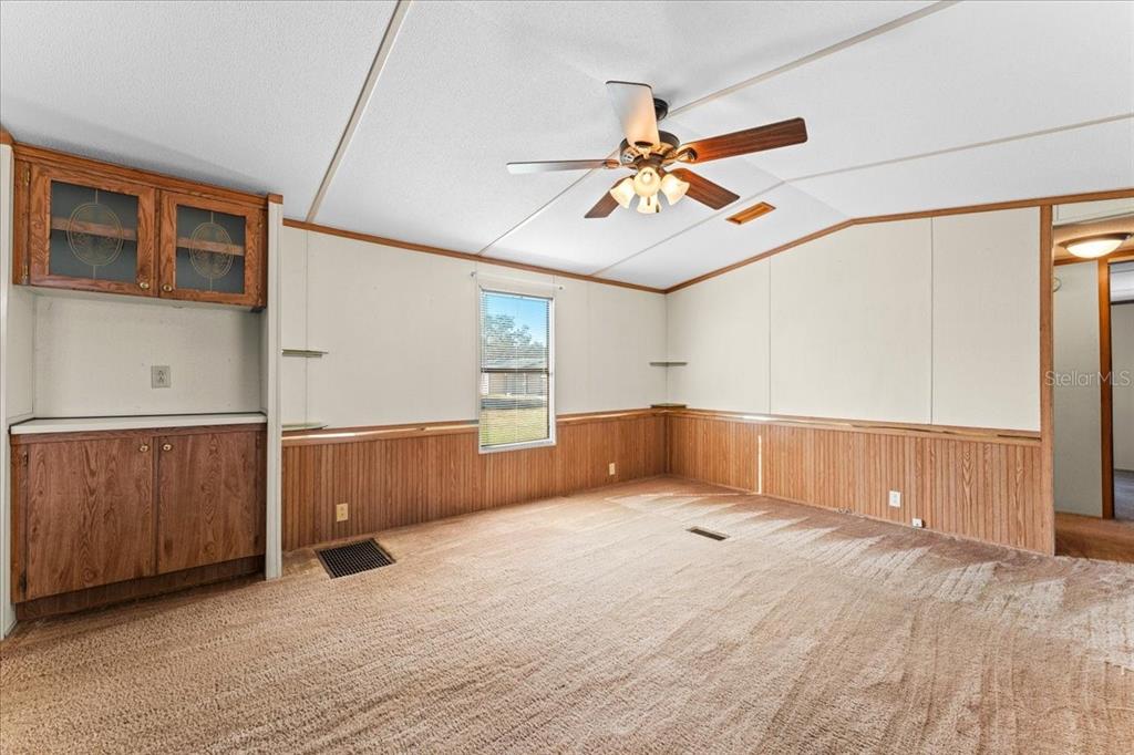 12001 Rhodine Road Riverview, FL 33579 - Photo 12 of 61 a view of an empty room with a window