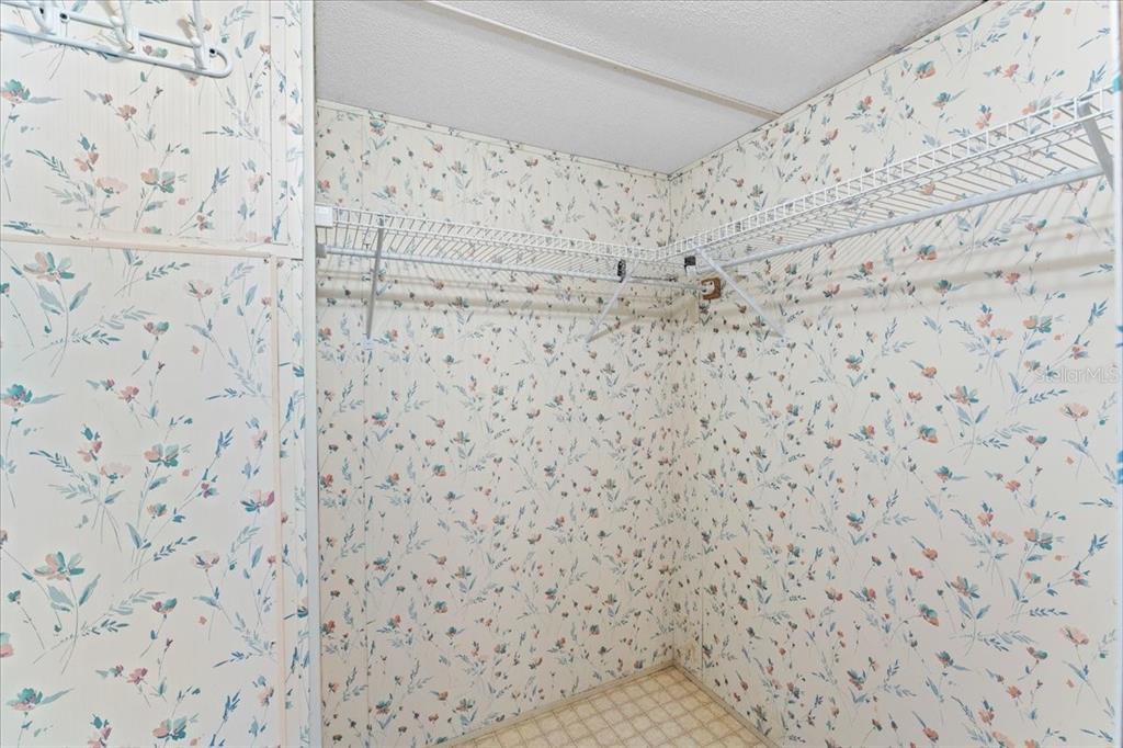 12001 Rhodine Road Riverview, FL 33579 - Photo 24 of 61 a bathroom with a shower curtain