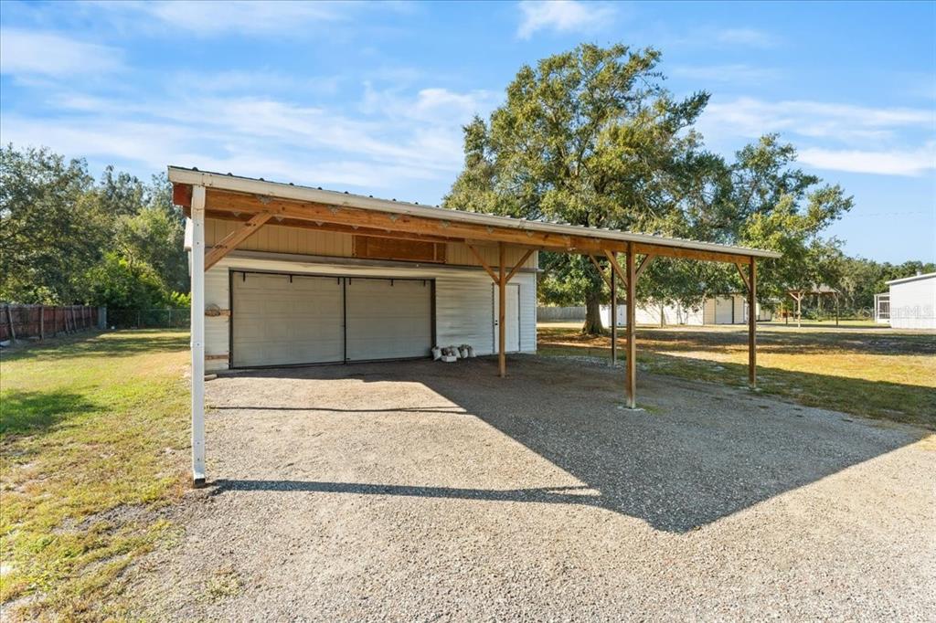 12001 Rhodine Road Riverview, FL 33579 - Photo 38 of 61 a view of backyard with large trees