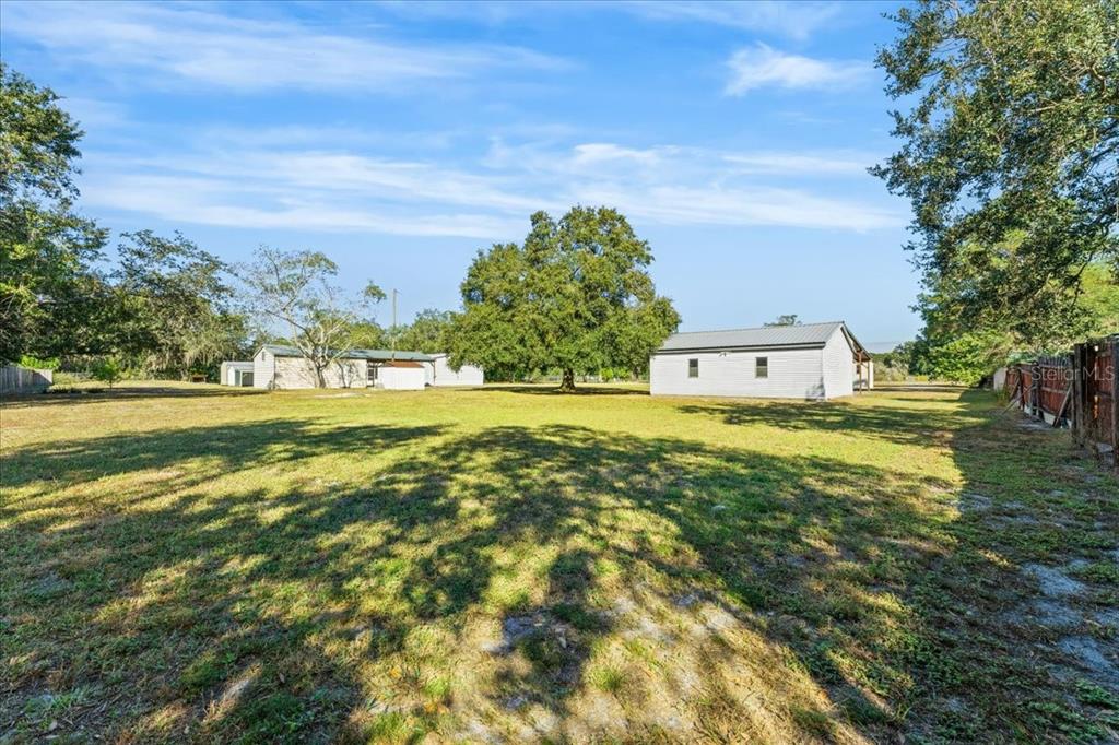 12001 Rhodine Road Riverview, FL 33579 - Photo 43 of 61 a house view with swimming pool in front of it