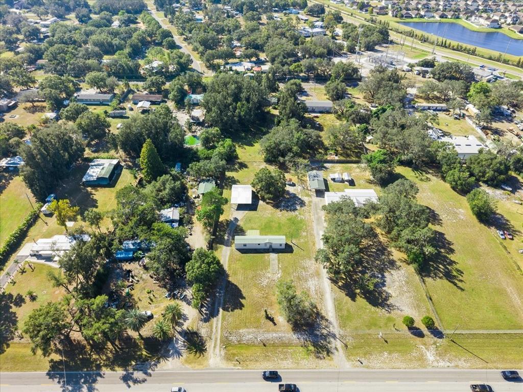 12001 Rhodine Road Riverview, FL 33579 - Photo 45 of 61 an aerial view of residential houses with outdoor space