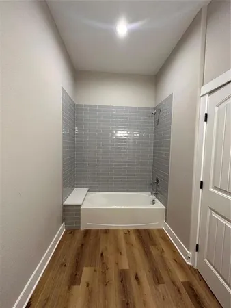 a bathroom with a bathtub