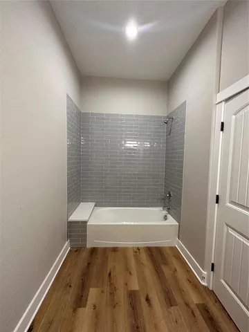 a bathroom with a bathtub