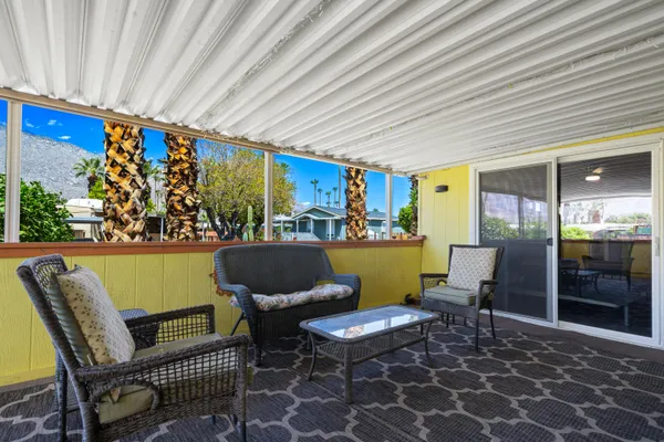 a large kitchen with stainless steel appliances a refrigerator and a stove