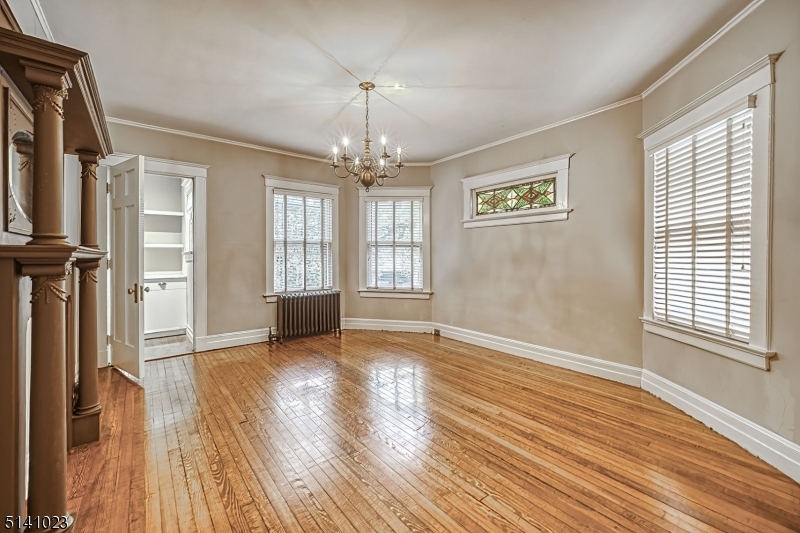 42 Gates Avenue Montclair, NJ 07042 - Photo 11 of 44 a view of livingroom with hardwood floor and window