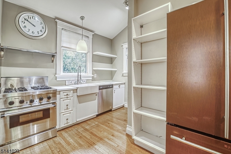 42 Gates Avenue Montclair, NJ 07042 - Photo 19 of 44 a kitchen with a stove oven and sink