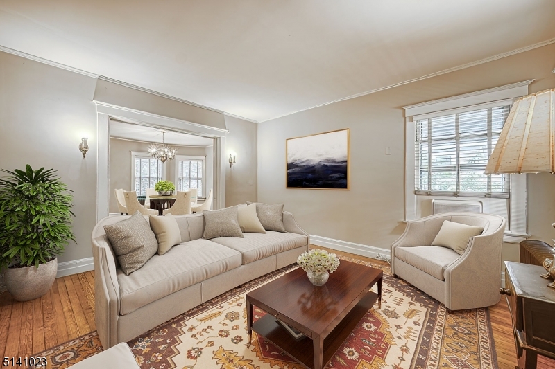 42 Gates Avenue Montclair, NJ 07042 - Photo 4 of 44 a living room with furniture and a flat screen tv