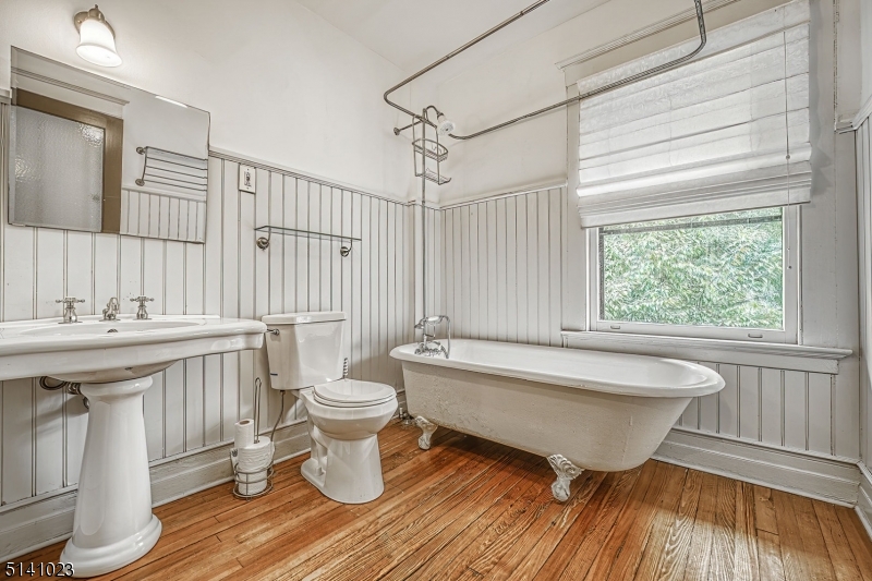 42 Gates Avenue Montclair, NJ 07042 - Photo 41 of 44 a very nice looking room with a large window and wooden floor