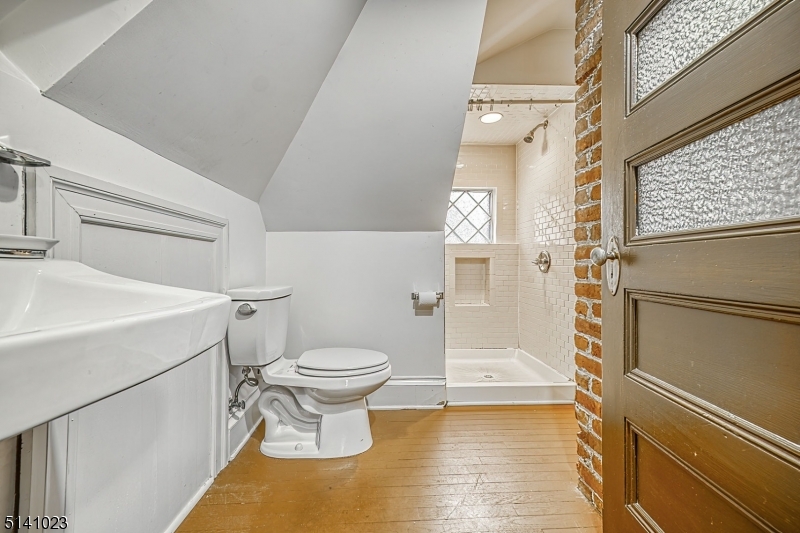 42 Gates Avenue Montclair, NJ 07042 - Photo 42 of 44 a bathroom with a toilet and a shower
