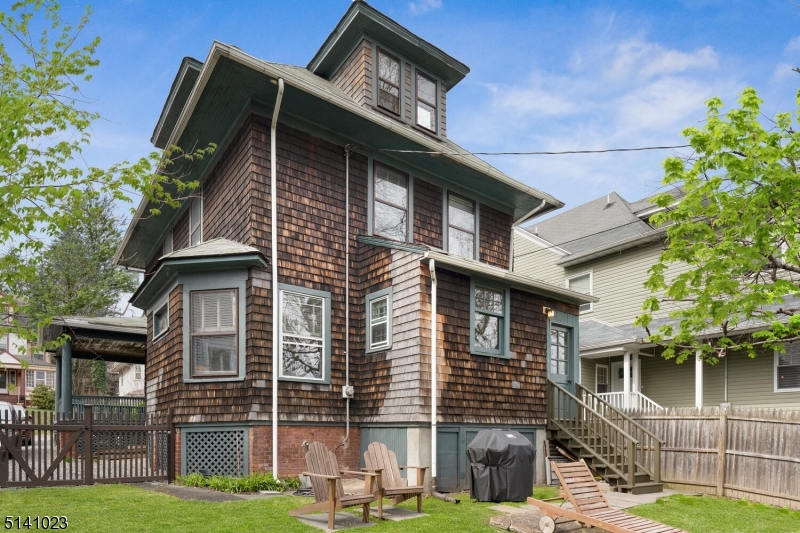 42 Gates Avenue Montclair, NJ 07042 - Photo 43 of 44 a front view of a house with garden