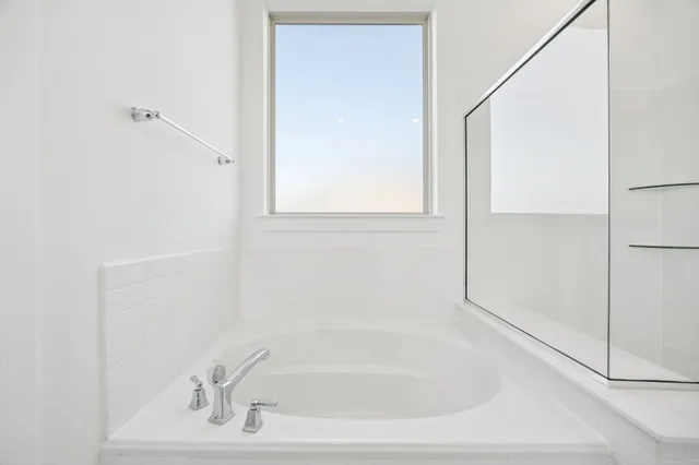 a bathroom with a bathtub