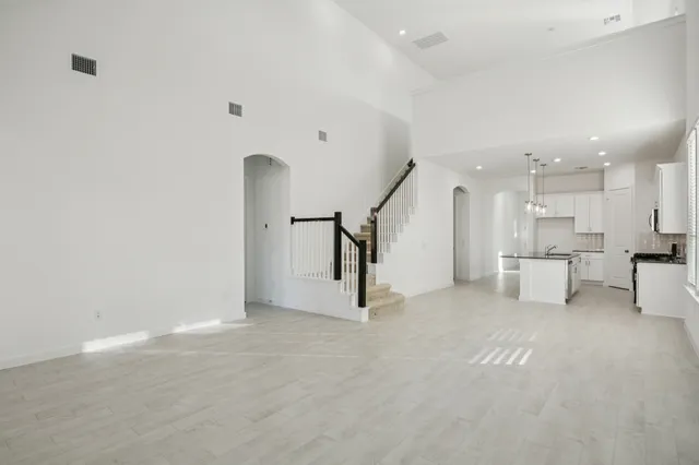 a view of a livingroom with a staircase