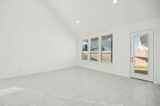 an empty room with windows